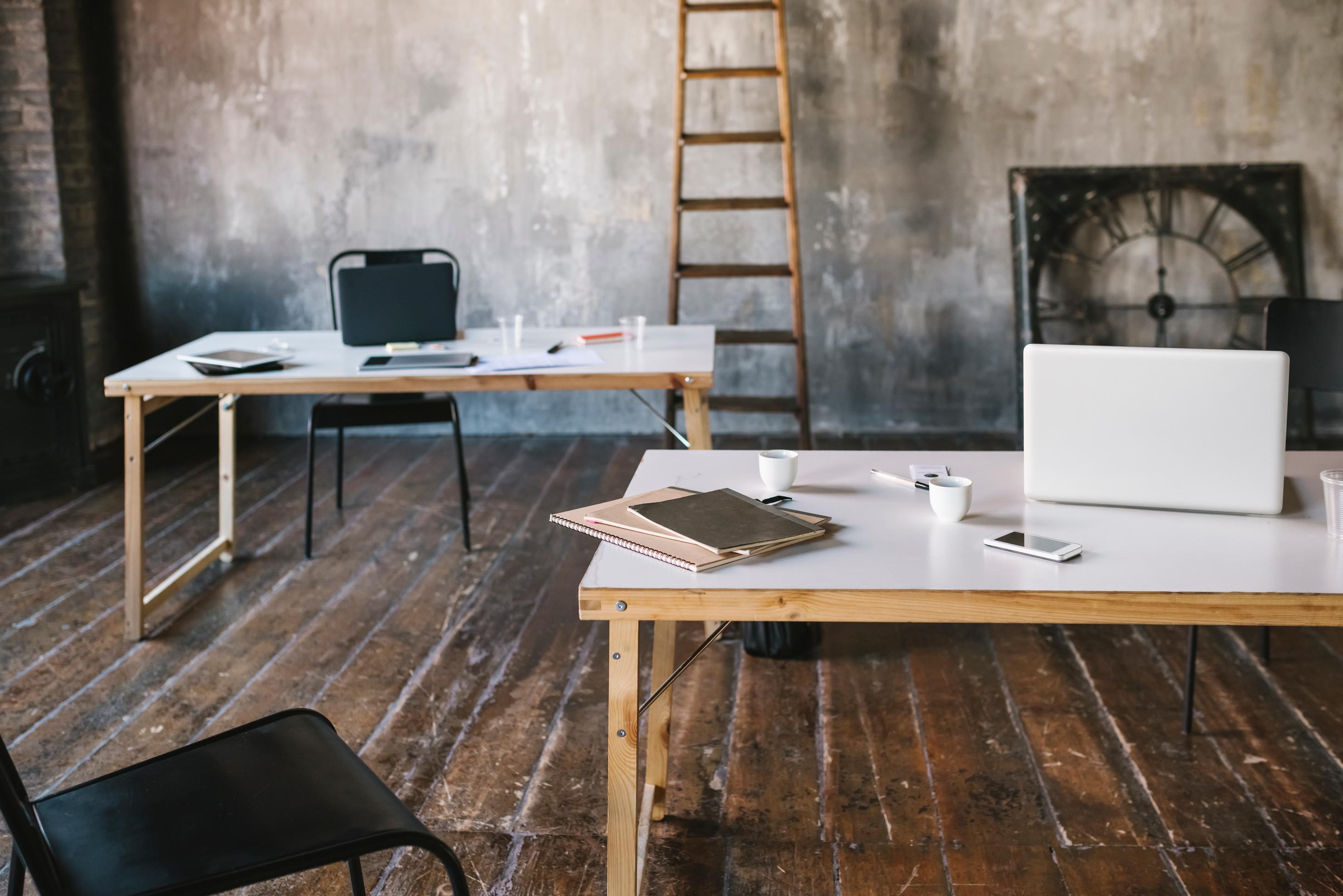 Industrial Work Space With Clock and Ladder